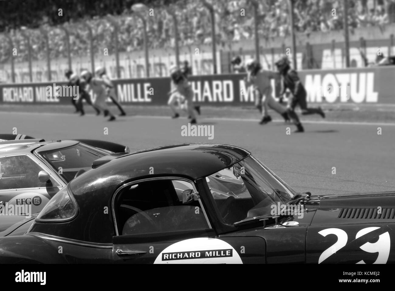 LE MANS, FRANCE, July 10, 2016 : Traditional Le Mans start during Le Mans Classic on the circuit of the 24 hours. No other event in the world assemble Stock Photo