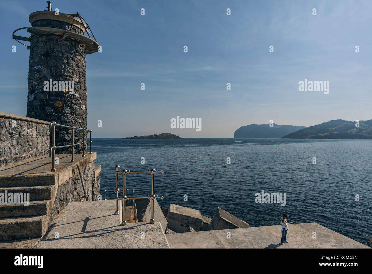 New breakwater and lighthouse on the malecon of the town of Bermeo, province of Vizcaya, Basque Country, Euskadi, Spain, Europe Stock Photo