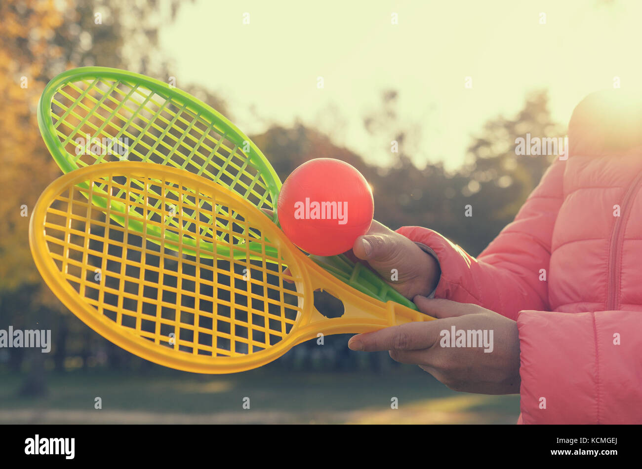 A tennis racket in his hand catches the ball in motion Stock Photo Alamy