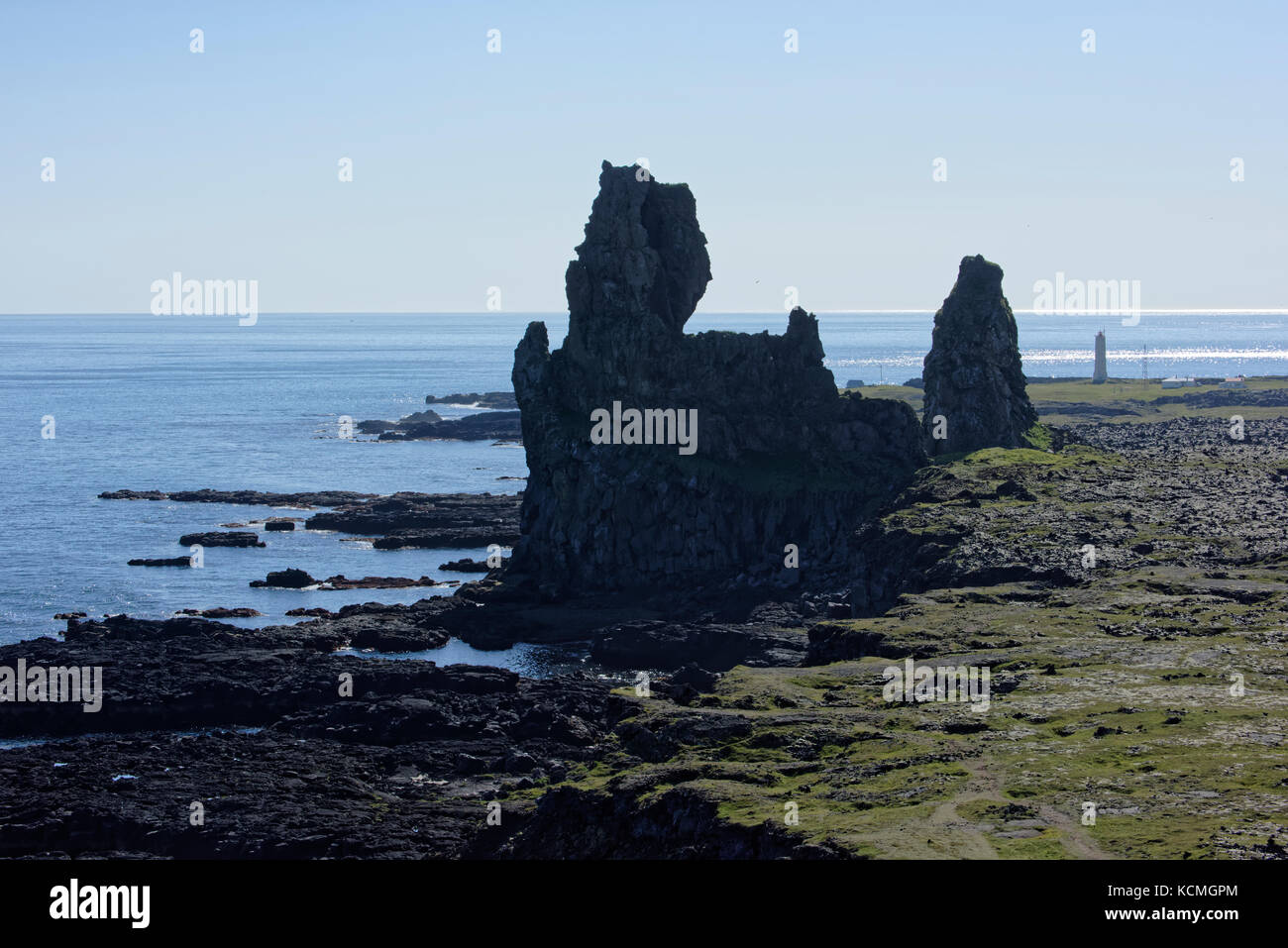 Shoreline and cliffs of basalt rock at Arnarstapi nature reserve seen ...