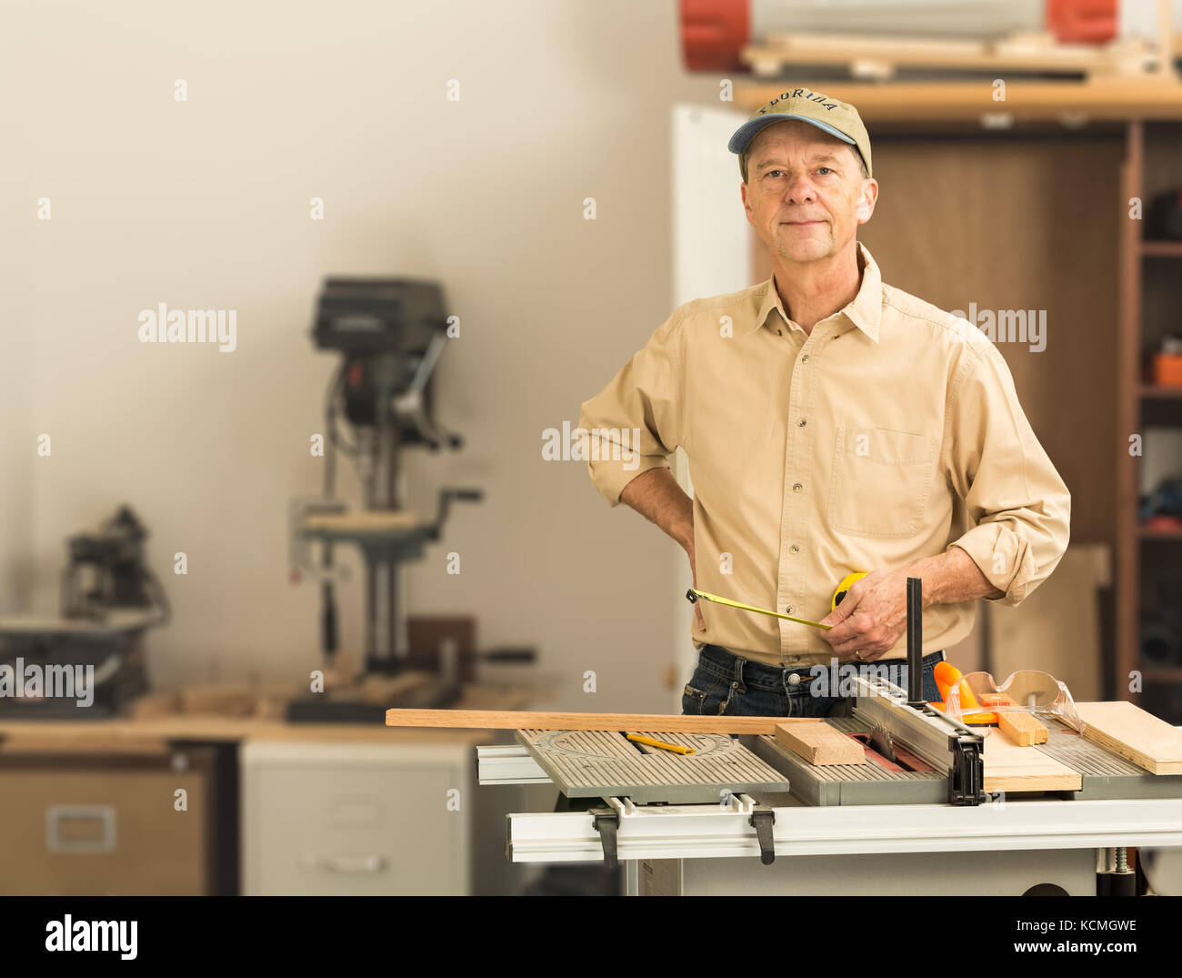 Senior caucasian man in home workshop Stock Photo