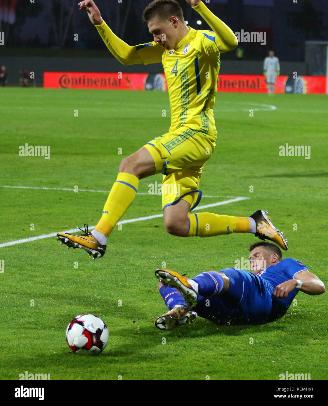 REYKJAVIK, ICELAND - SEPTEMBER 5, 2017: Johann Gudmundsson of Iceland (Down) fights for a ball with Mykola Matviyenko of Ukraine during their FIFA Wor Stock Photo