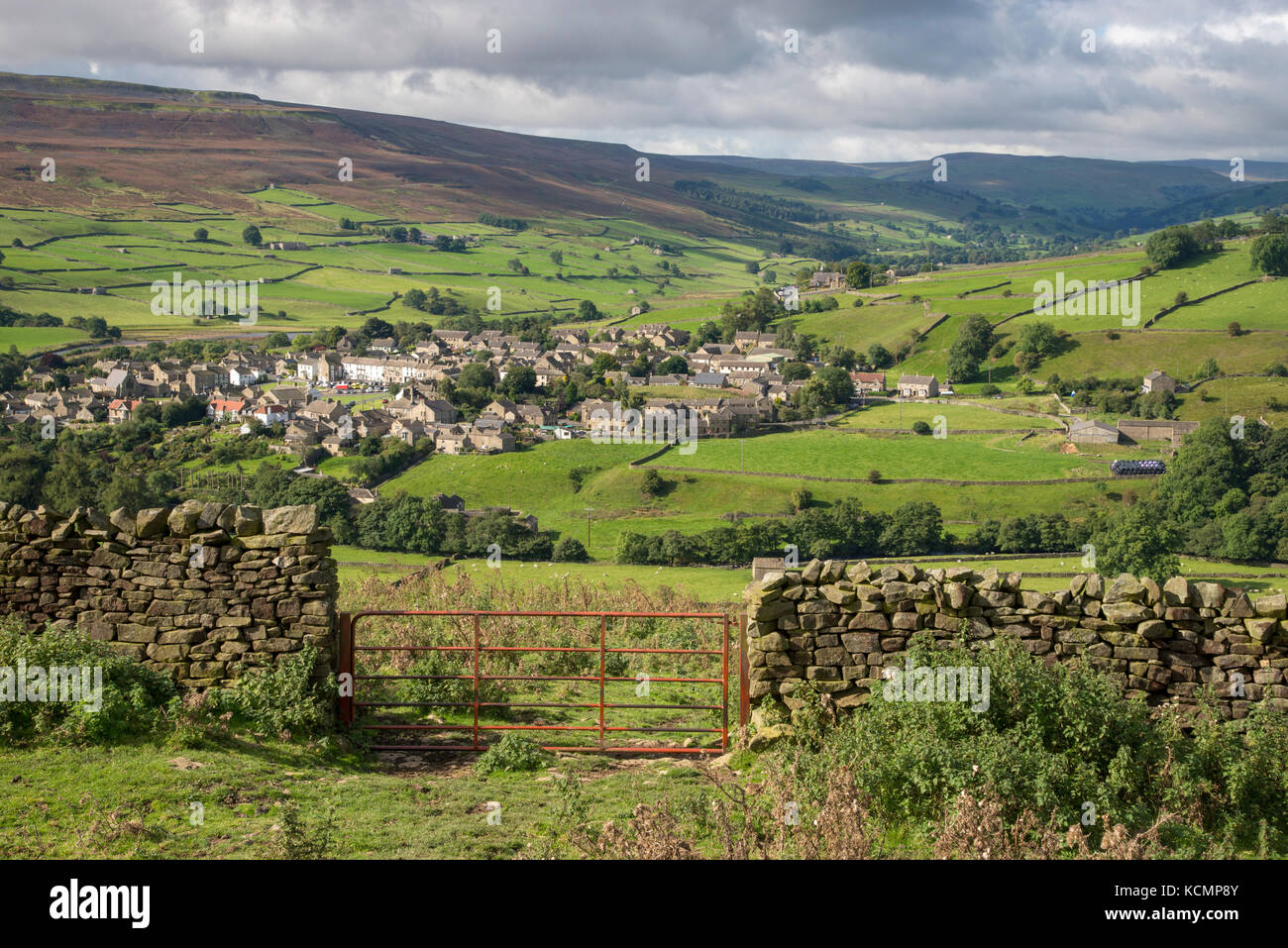 View of the village of Reeth from the hillside below Fremington edge in North Yorkshire, England. Stock Photo