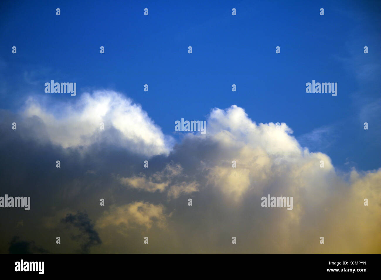 dramatic white clouds on blue sky Stock Photo - Alamy