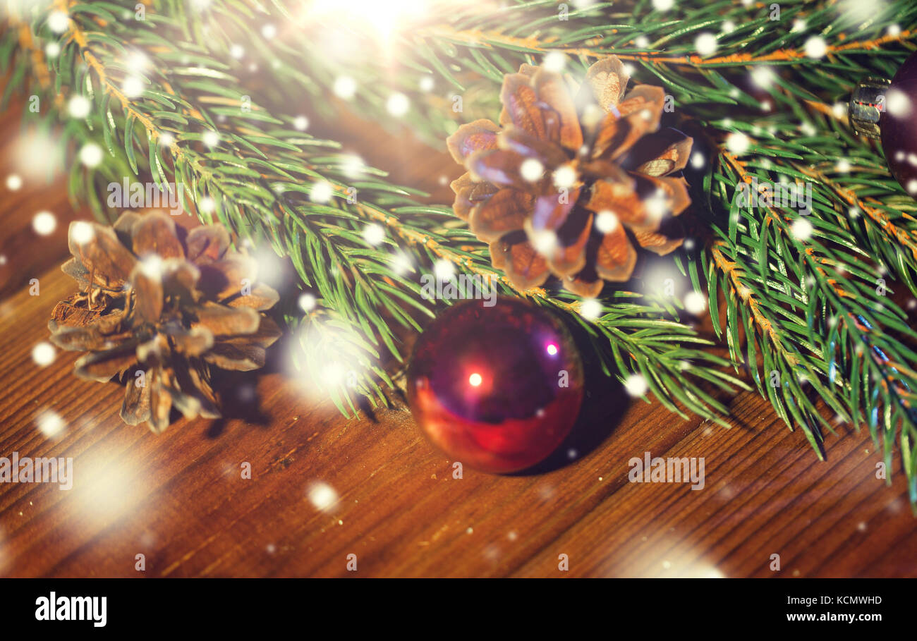 fir branch with christmas ball and pinecones Stock Photo - Alamy