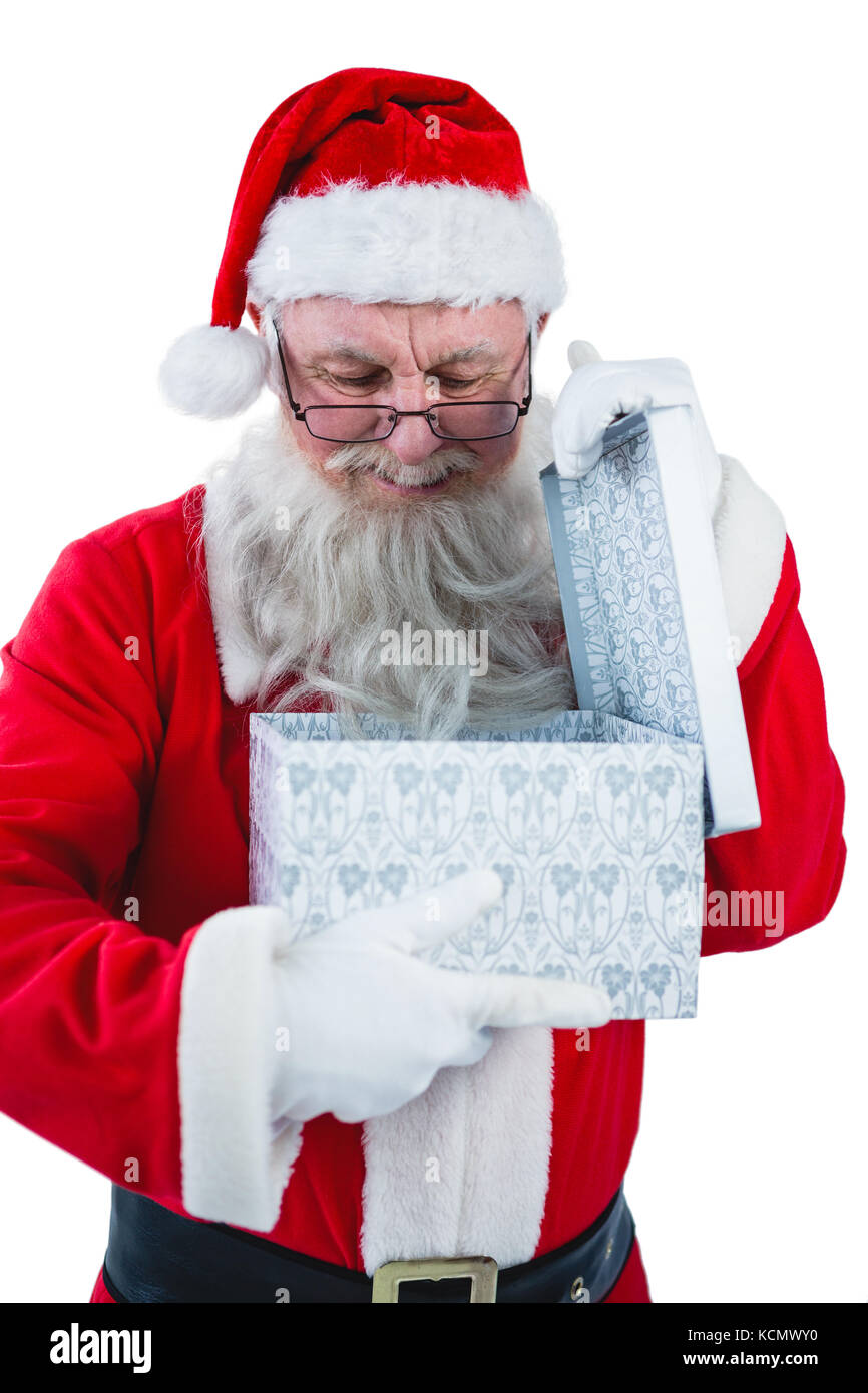 Santa Claus opening a gift box against white background Stock Photo - Alamy