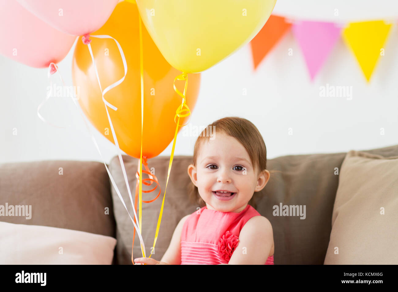 happy baby girl on birthday party at home Stock Photo - Alamy