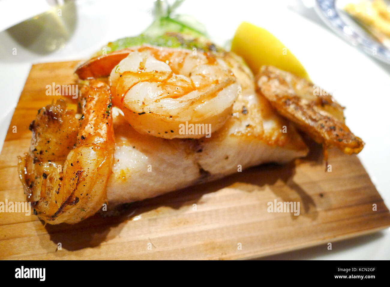 Delicious shrimp dinner menu in a fancy restaurant Stock Photo - Alamy