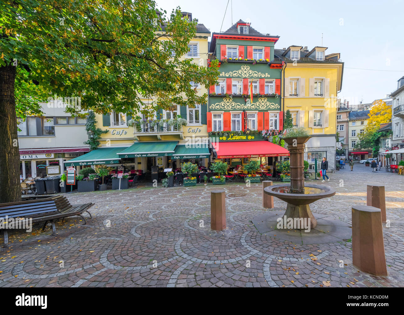 square in the city with old houses and fountain, spa town Baden-Baden, Baden-Wuerttemberg, outskirts of Black Forest, Germany Stock Photo