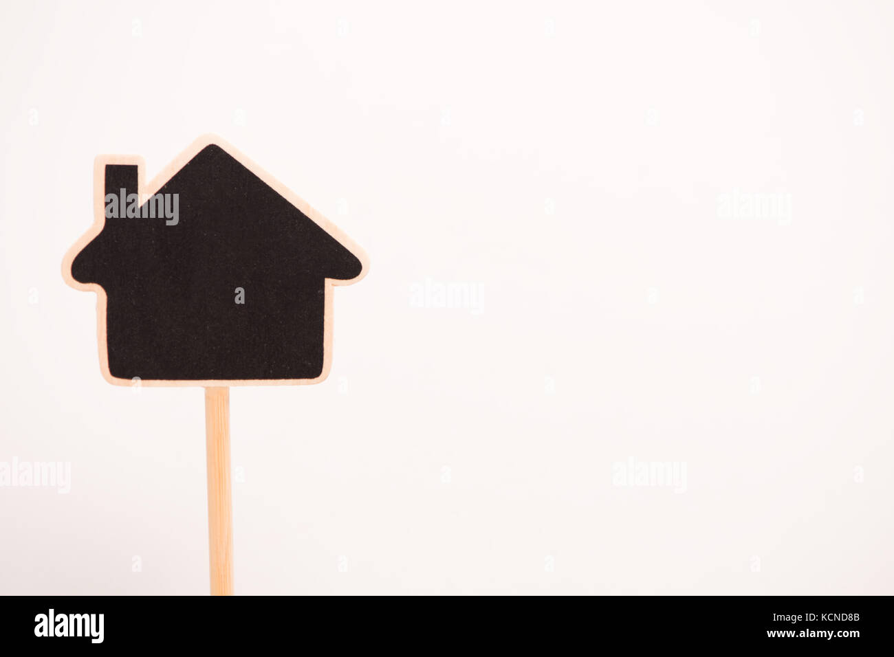 New home concept. Chalk board shaped house Stock Photo Alamy