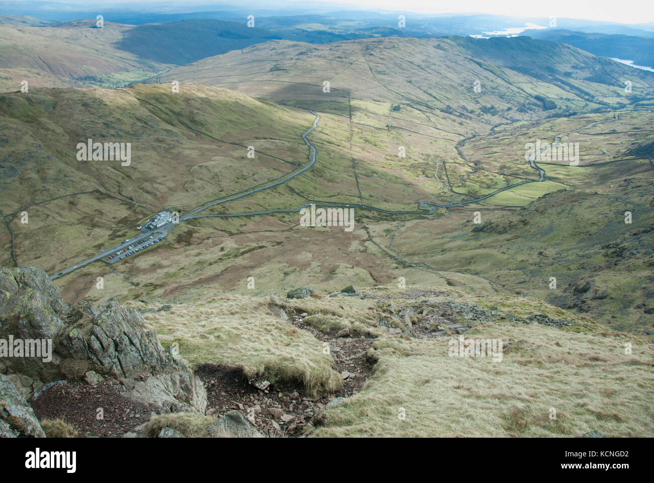 Kirstone Inn and Kirkstone Pass seen from descent of Red Screes, near Ambleside, Lake District, UK Stock Photo