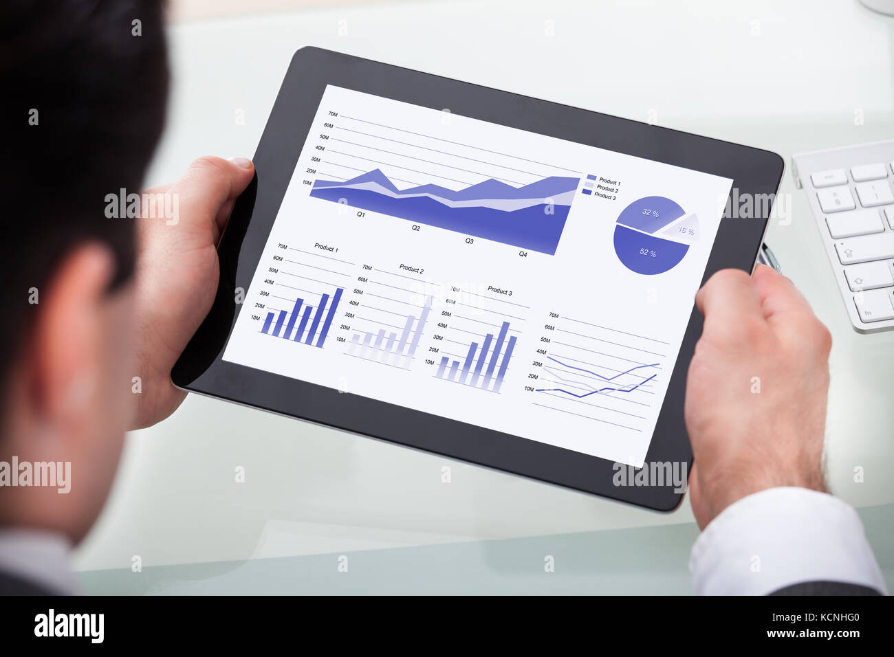 Close-up Of A Businessman Analyzing Graph On Digital Tablet Stock Photo ...
