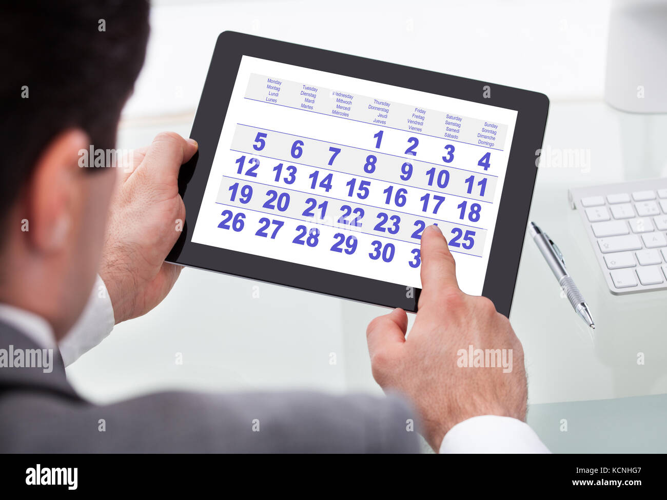 Looking at the calendar hi-res stock photography and images - Alamy