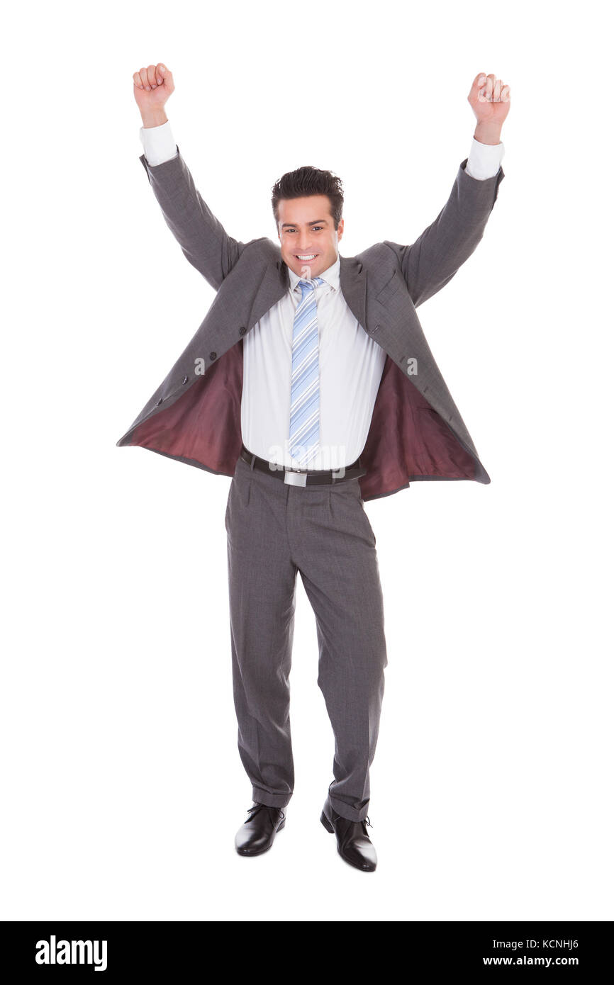 Portrait Of Excited Young Businessman With Hand Raised Stock Photo - Alamy