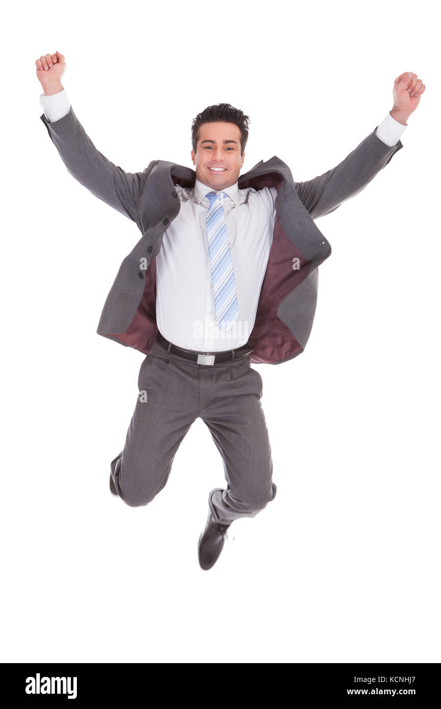 Portrait Of Excited Young Businessman With Hand Raised Stock Photo - Alamy
