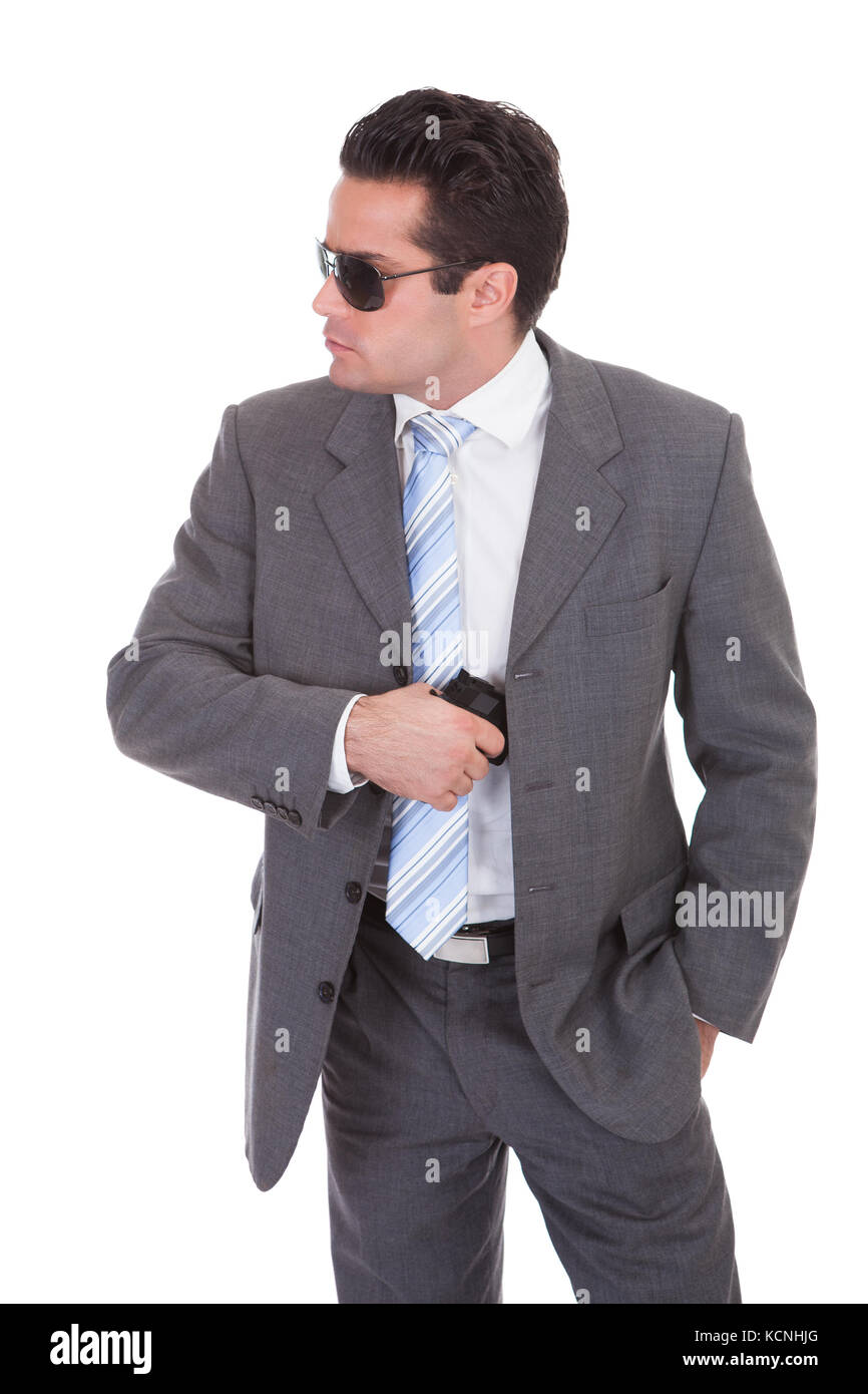 Portrait Of Young Handsome Man With Black Sunglasses And Gun Stock ...