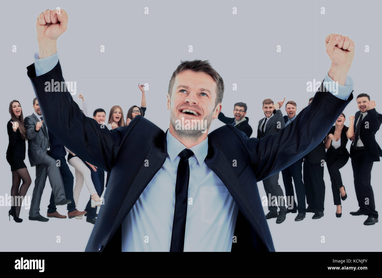 One very happy energetic businessman with his arms raised Stock Photo ...