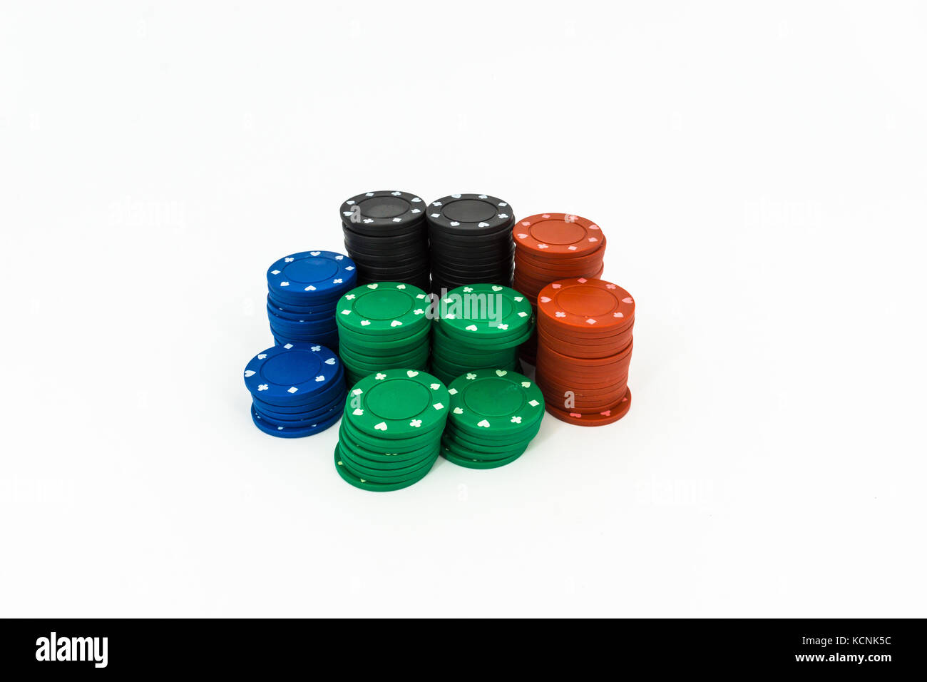 Poker chips isolated on white background in red black green blue Stock