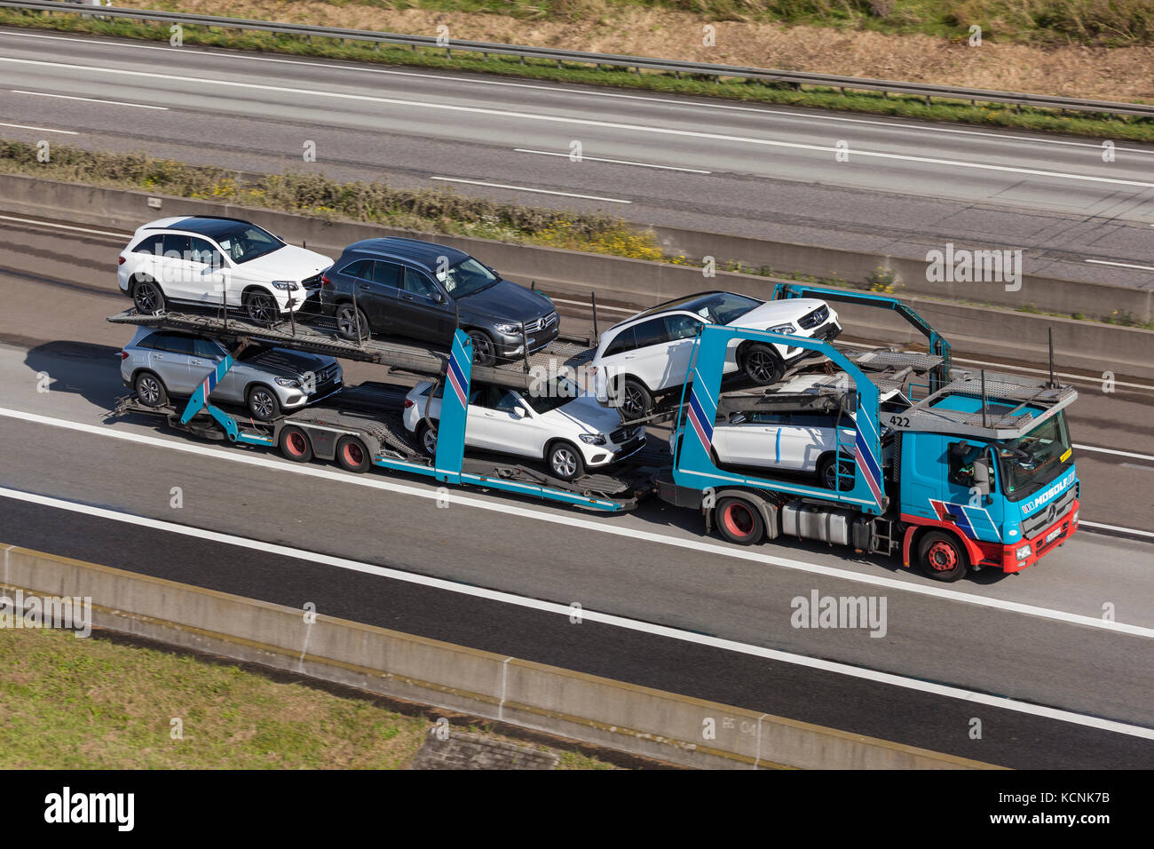 Frankfurt, Germany - Sep 19, 2017: Mercedes Benz Actros car transporter hauls Mercedes Benz SUVs along the A45 highway in Germany Stock Photo