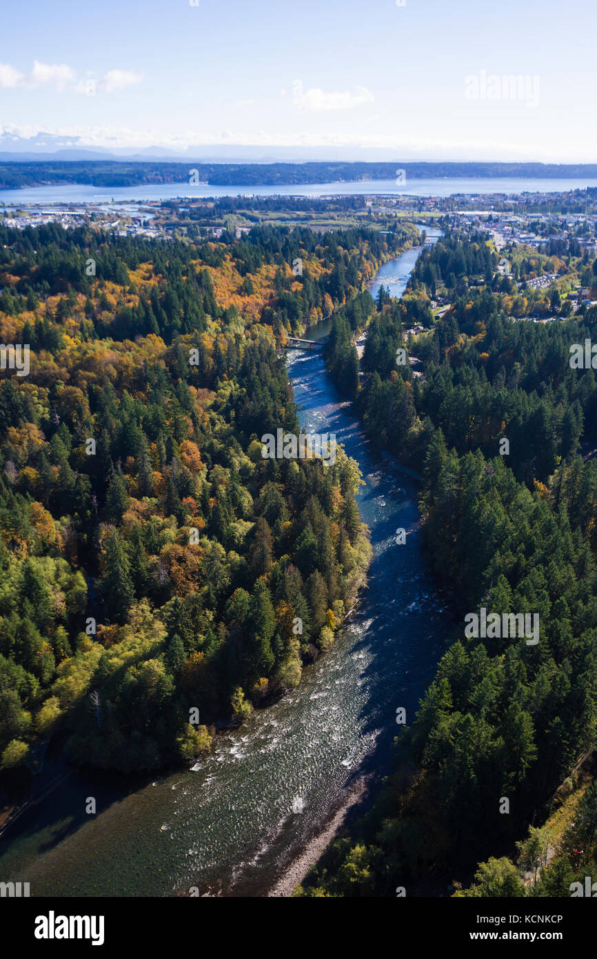 An aerial perspective of the Campbell River flowing out to the estuary and Discovery Passage. Stock Photo