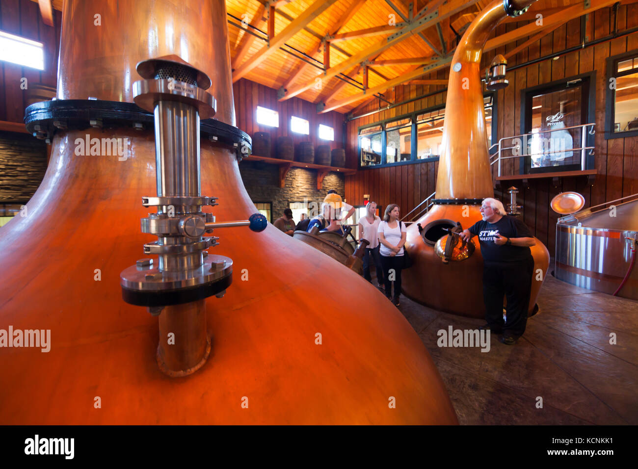Huge copper kettles used for producing Whiskey are part of a tour for