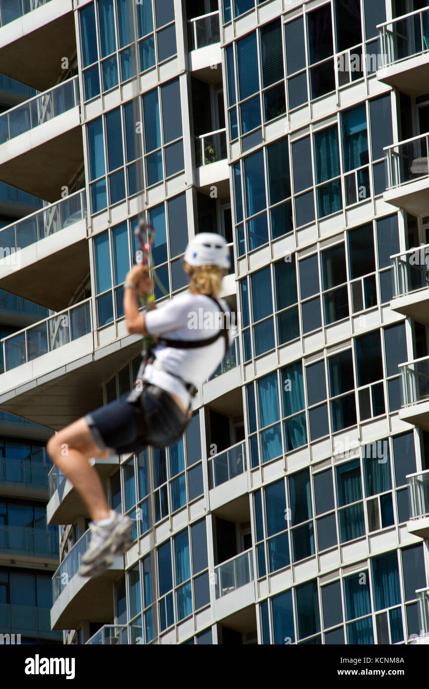 zip lining in the city Stock Photo