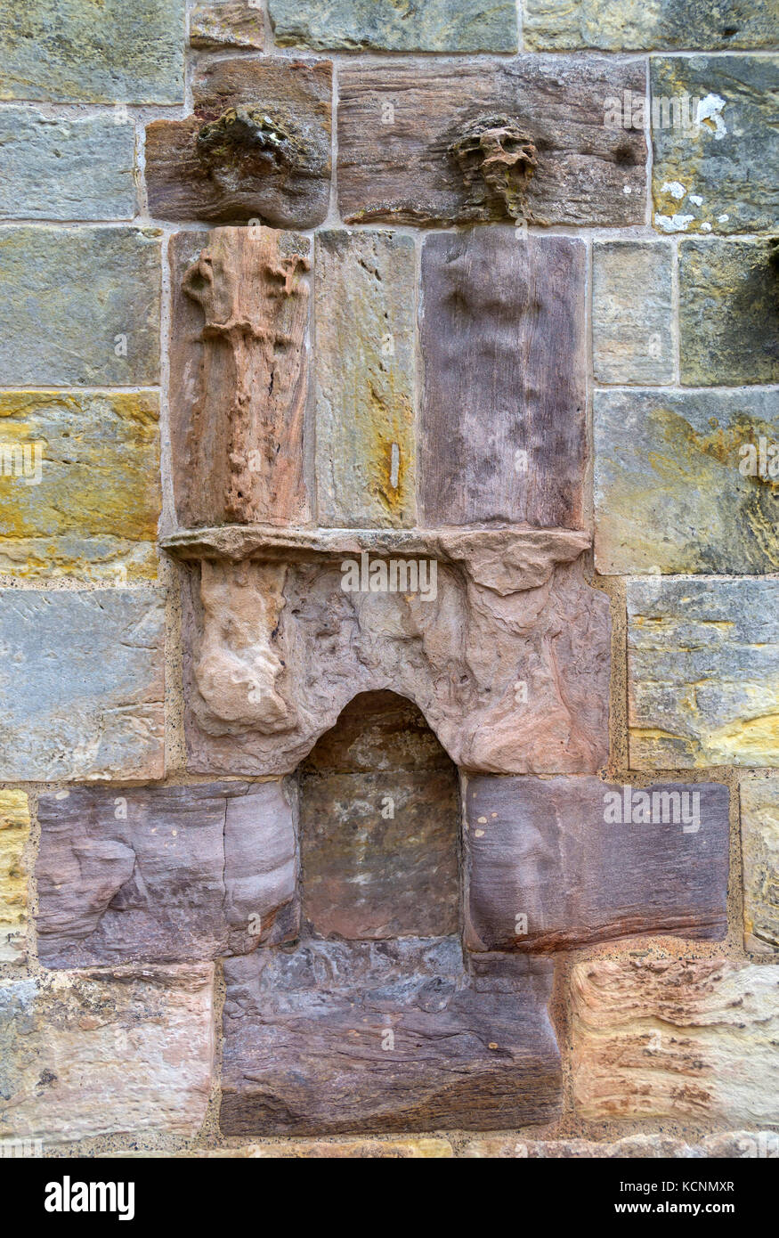 Ancient religious carvings on the exterior sandstone of Rosslyn Chapel, Scotland Stock Photo
