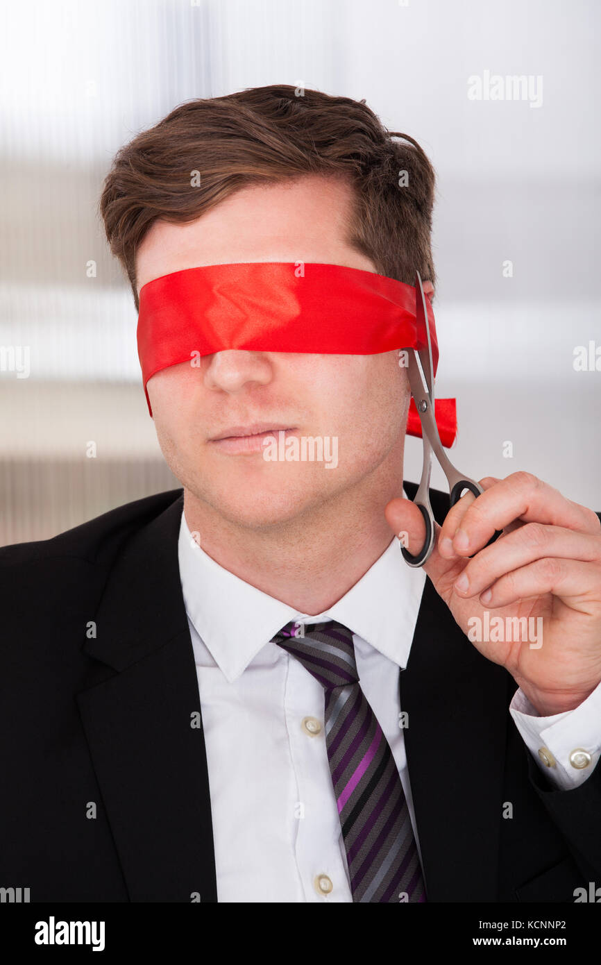 Wearing a blindfold hi-res stock photography and images - Alamy