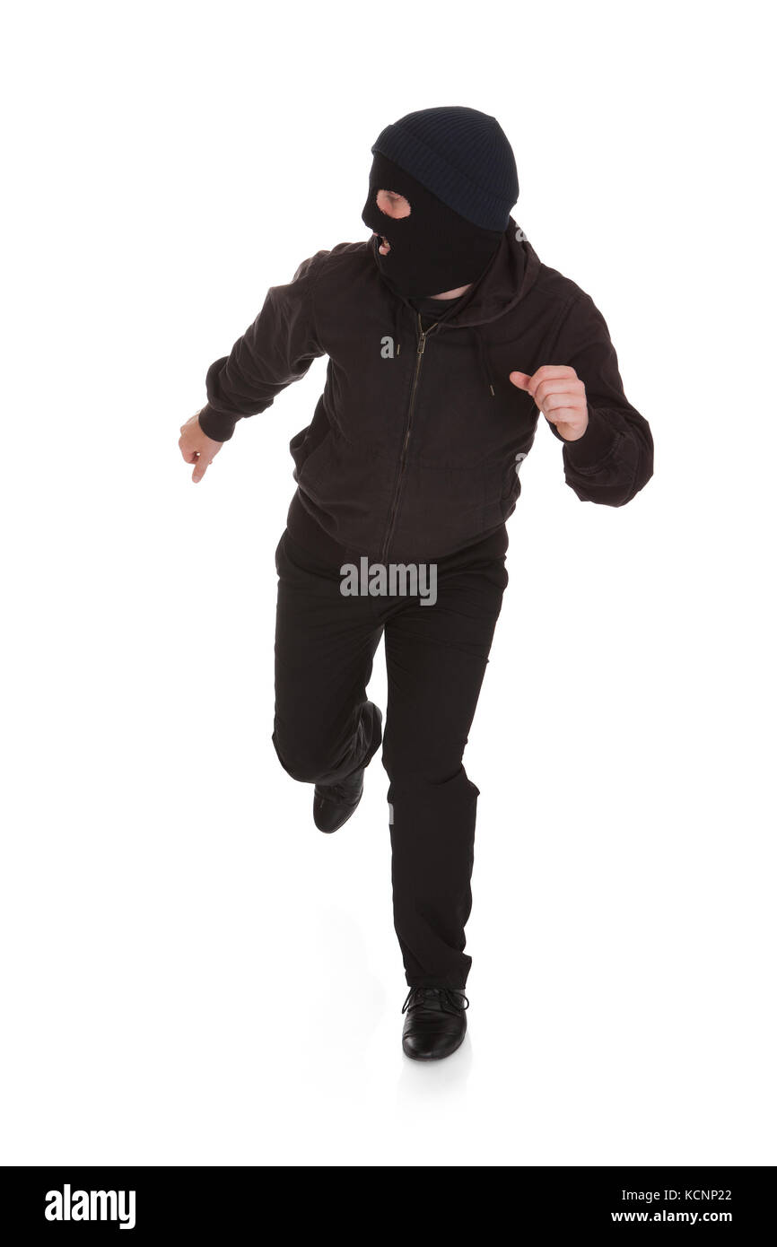 Man Wearing Mask Running Over White Background Stock Photo Alamy