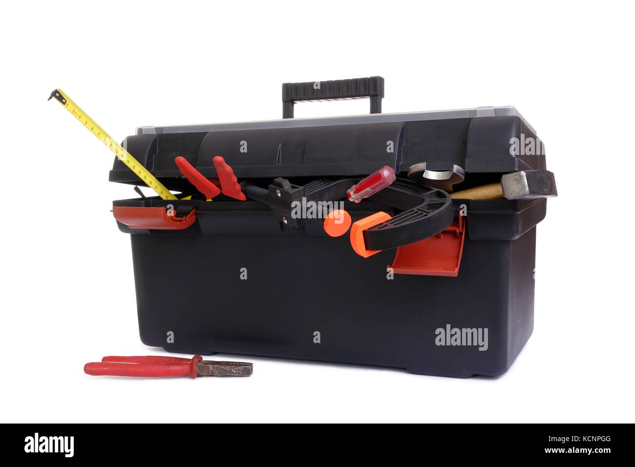 Plastic black toolbox with assorted tool set over white background Stock Photo