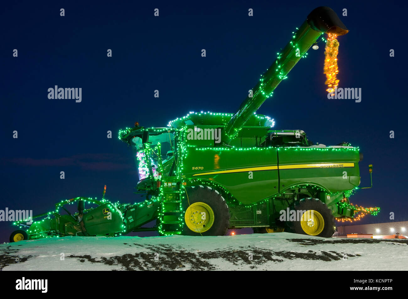 combine harvester with Christmas lights, Manitoba, Canada Stock Photo Alamy