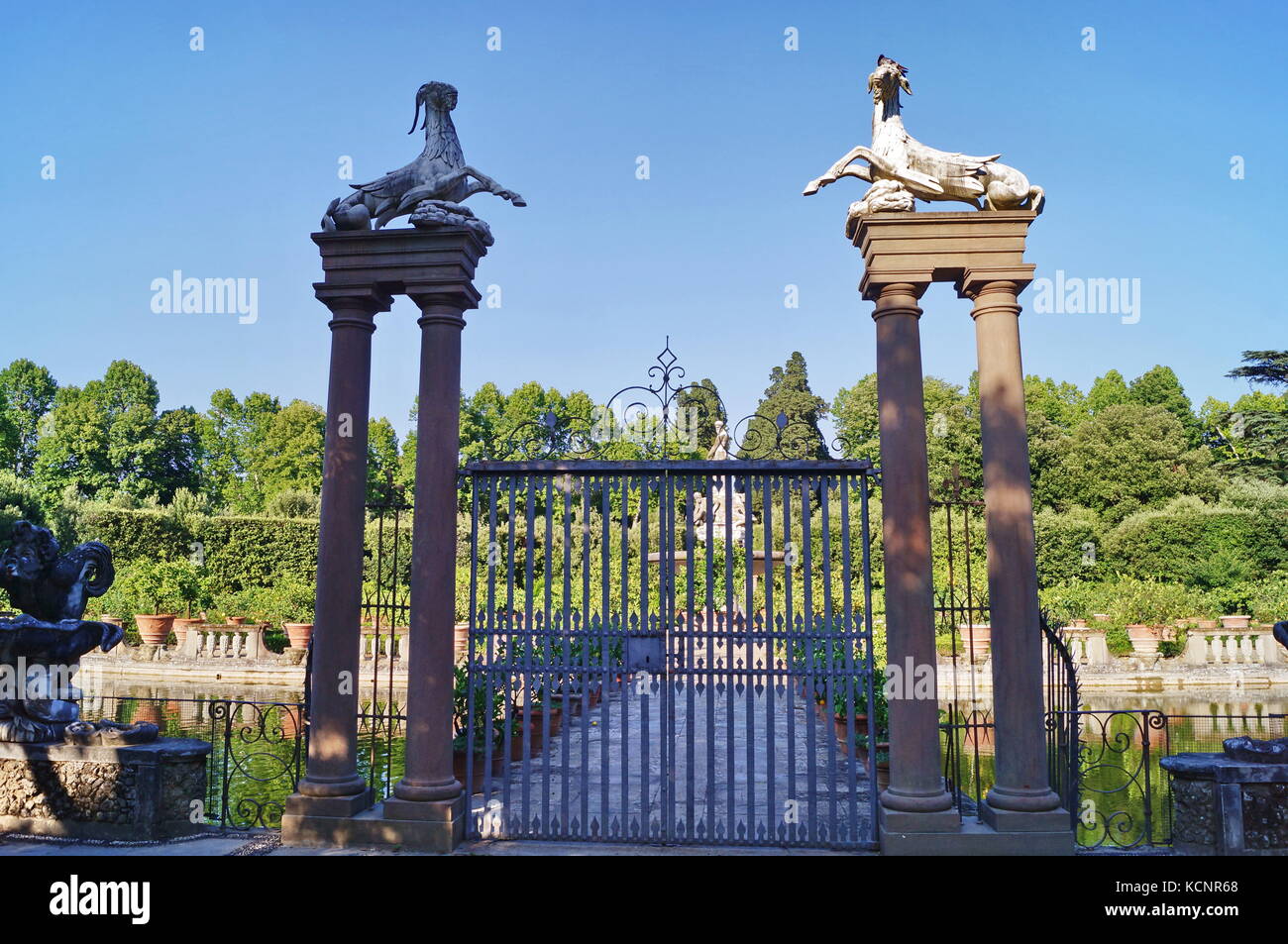 Gate with capricorns and harpys in Island Fountain Boboli Gardens Florence Tuscany Italy. Stock Photo