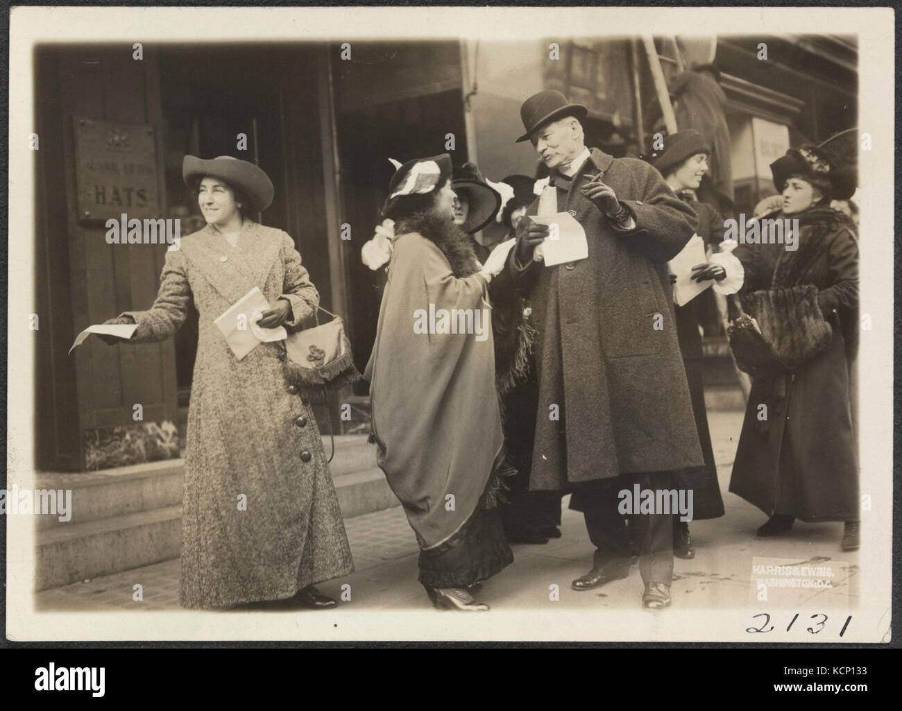 Check Bill Hander Distributing hand bills 159008v Stock Photo - Alamy