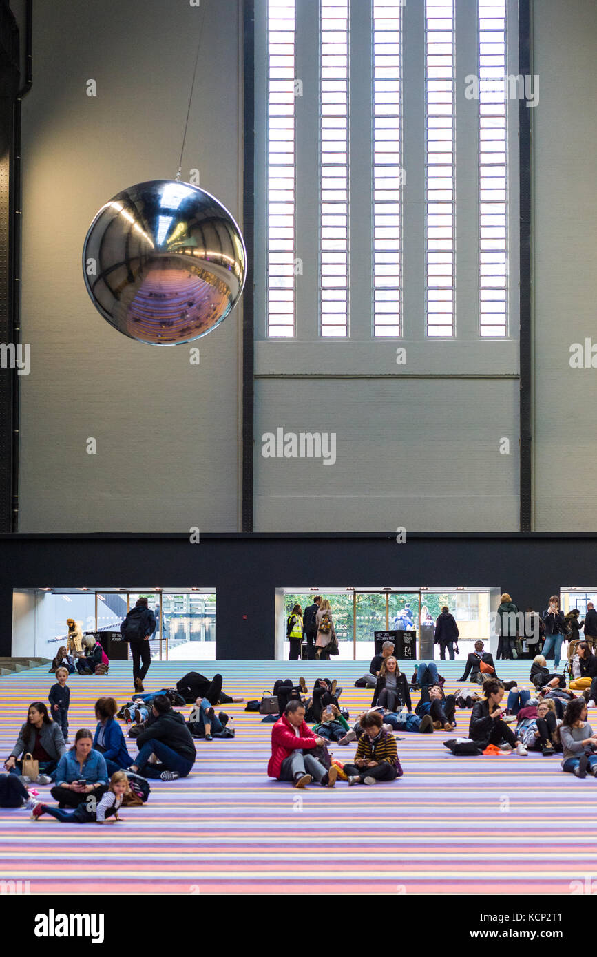 Giant pendulum exhibit by Danish artists Superflex in the Turbine Hall of the Tate Modern art gallery, South Bank, London, England, UK Stock Photo