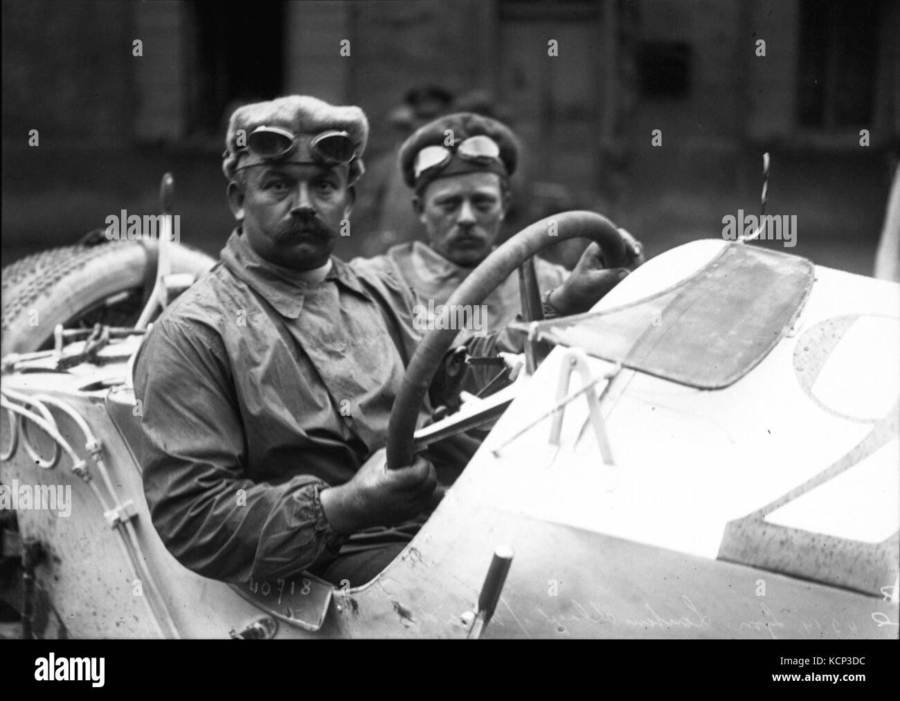 This photograph captures Christian Lautenschlager during the 1914 French Grand Prix, a major motorsport event. Lautenschlager, a French driver, won the race, driving for the Peugeot team, marking an important victory in early motorsport history. Stock Photo