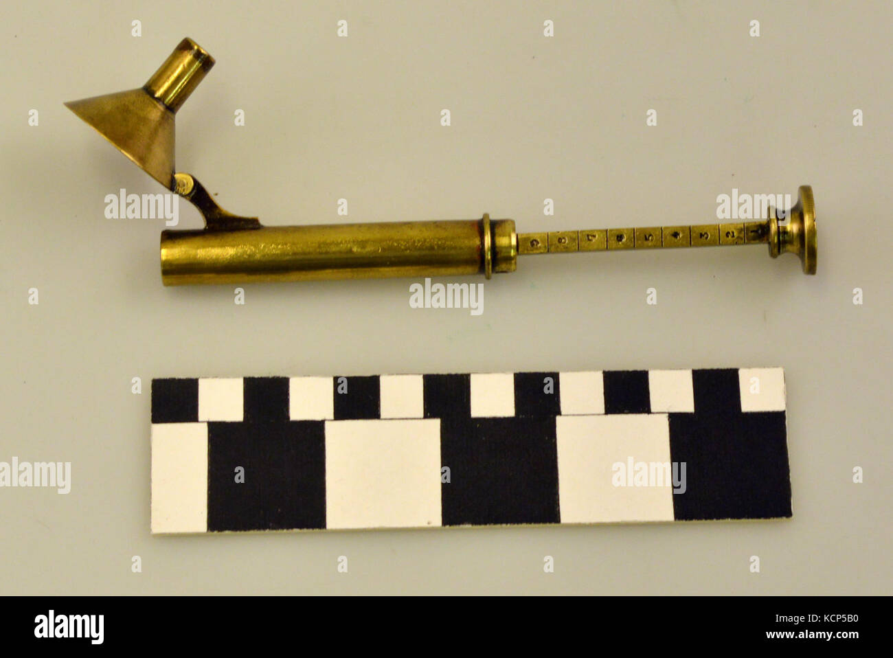 Brass Powder Measure with Funnel Stock Photo Alamy