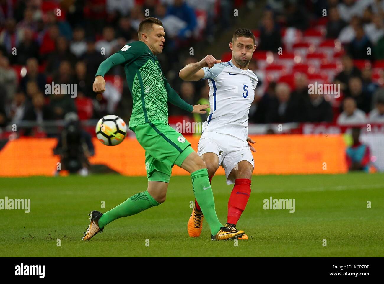 Gary Cahill of England (R)  during the FIFA World Cup Qualifier match between England and Slovenia at Wembley Stadium in London. 05 Oct 2017 Stock Photo