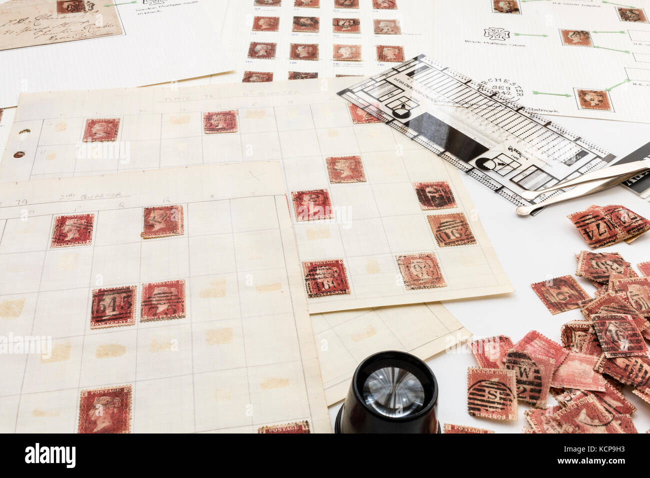 England. Stamp collecting. Album pages with English Victorian 1 penny red stamps, with piles of