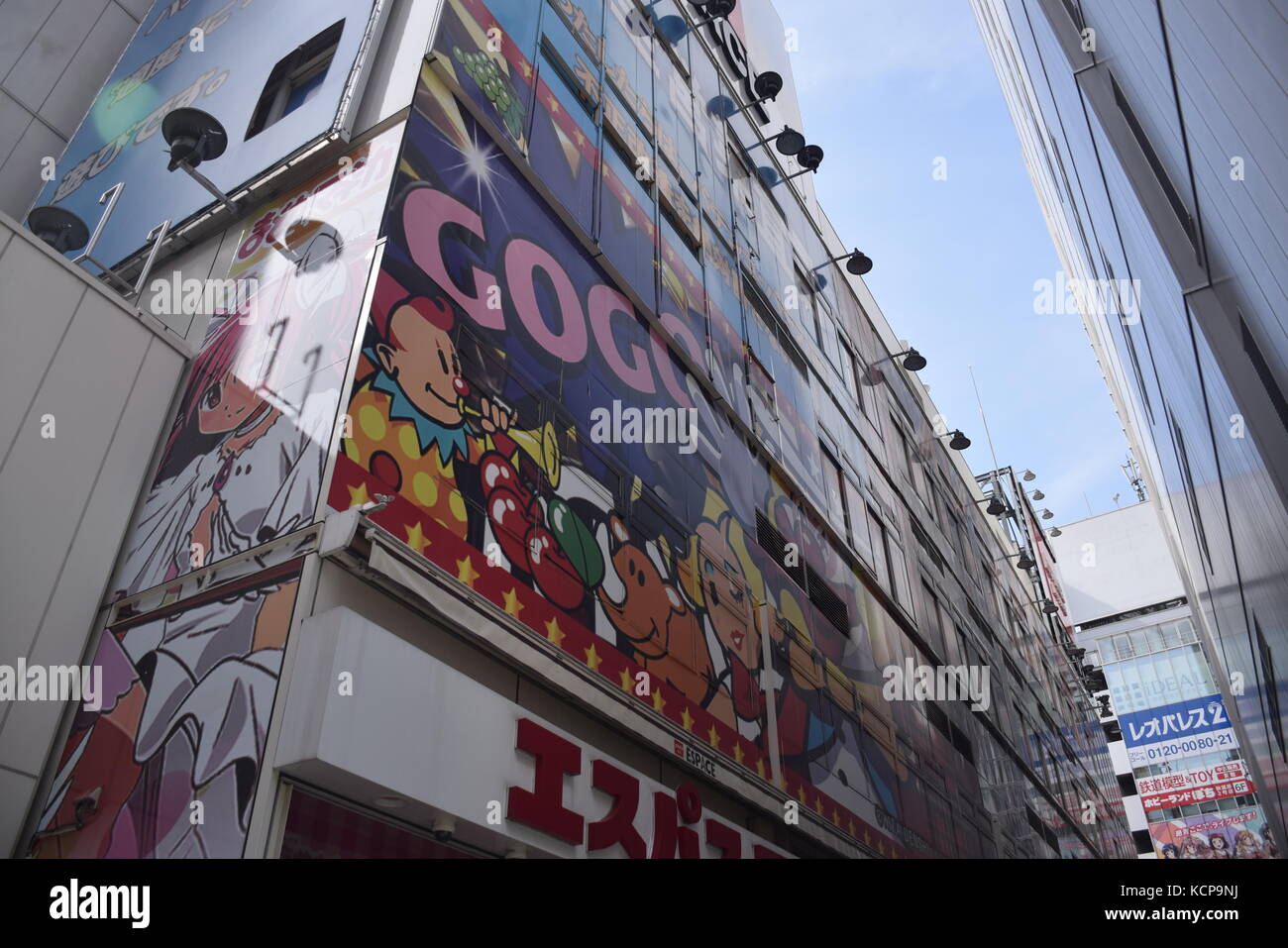 Colorful advertisements on the buildings in Akihabara, famous district for electronic and manga shops in Tokyo, Japan Stock Photo