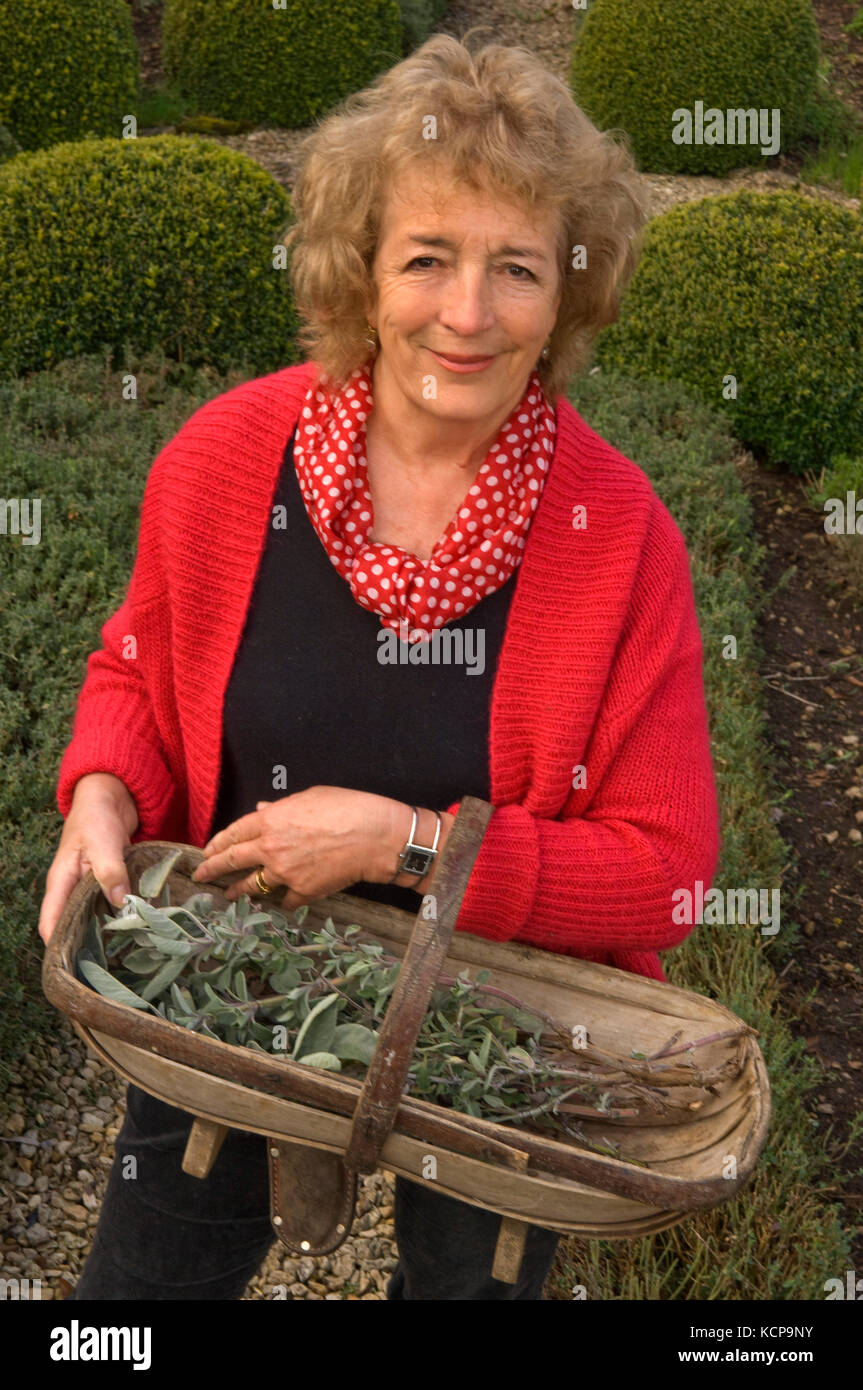 Gardener, author, broadcaster Judith Hann in her herb garden Stock