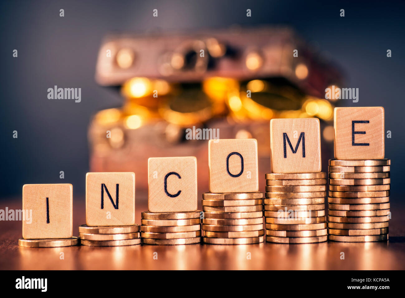 Stack of coins and the word income Stock Photo