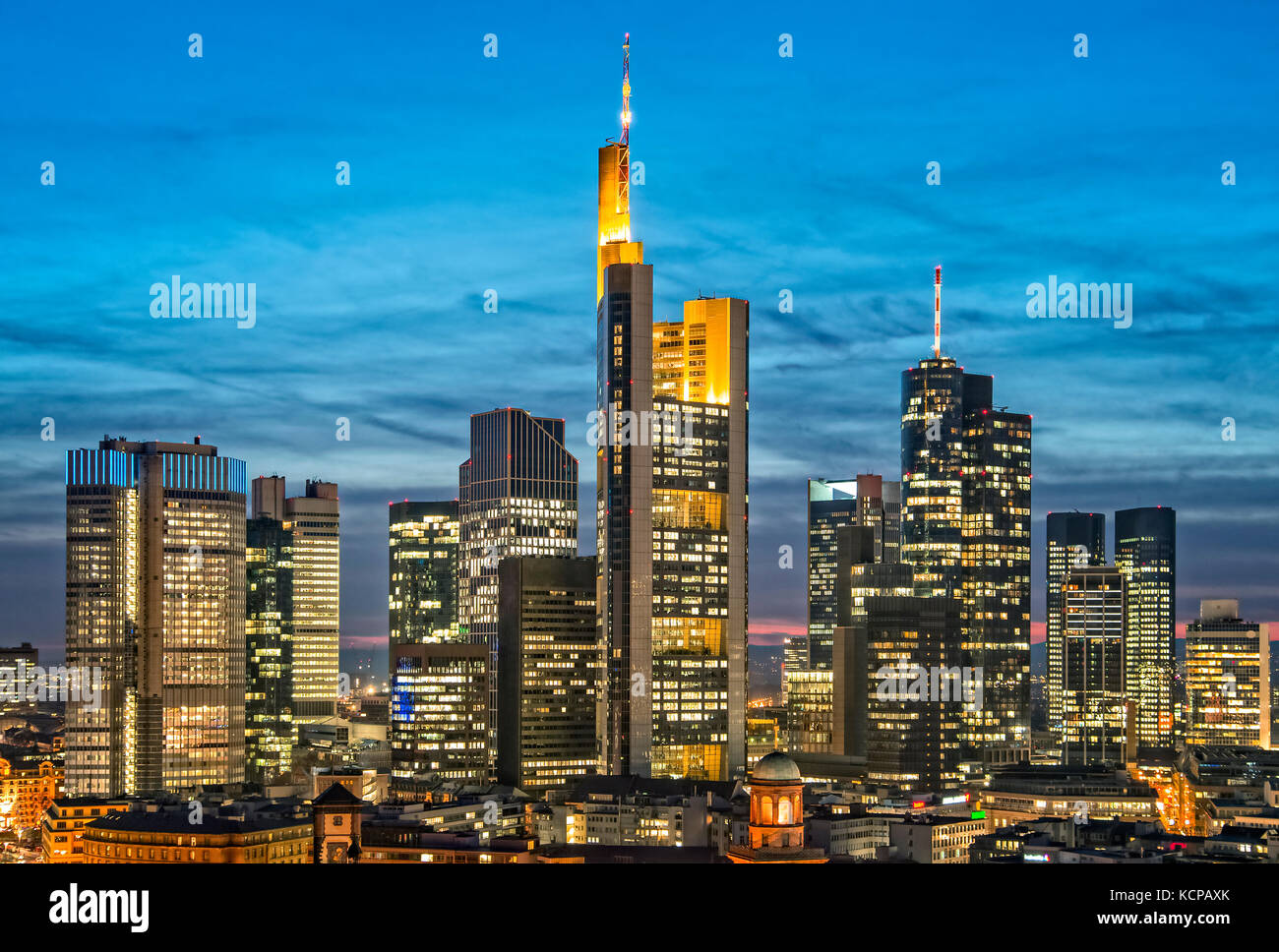 Skyline of Frankfurt with illuminated skyscrapers Stock Photo