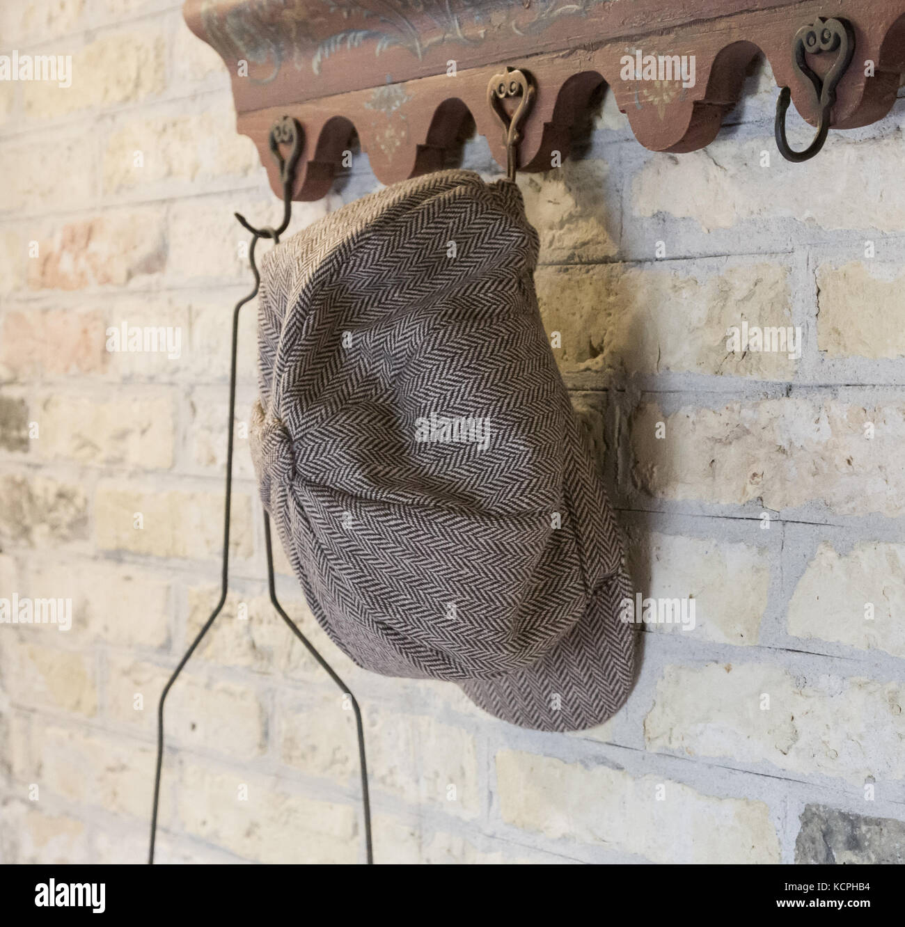 Old farmers hat hanging on a hanger - The Netherlands Stock Photo