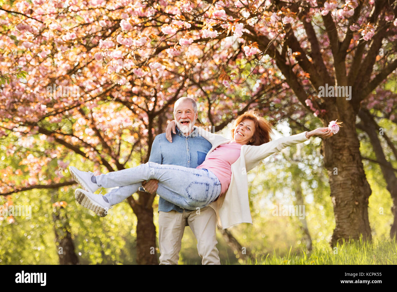 Senior couple in love outside in spring nature Stock Photo - Alamy
