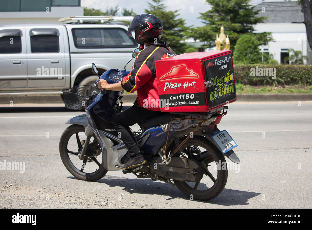 CHIANG MAI, THAILAND SEPTEMBER 23 2017 Delivery service man ride a Motercycle of Pizza Hut