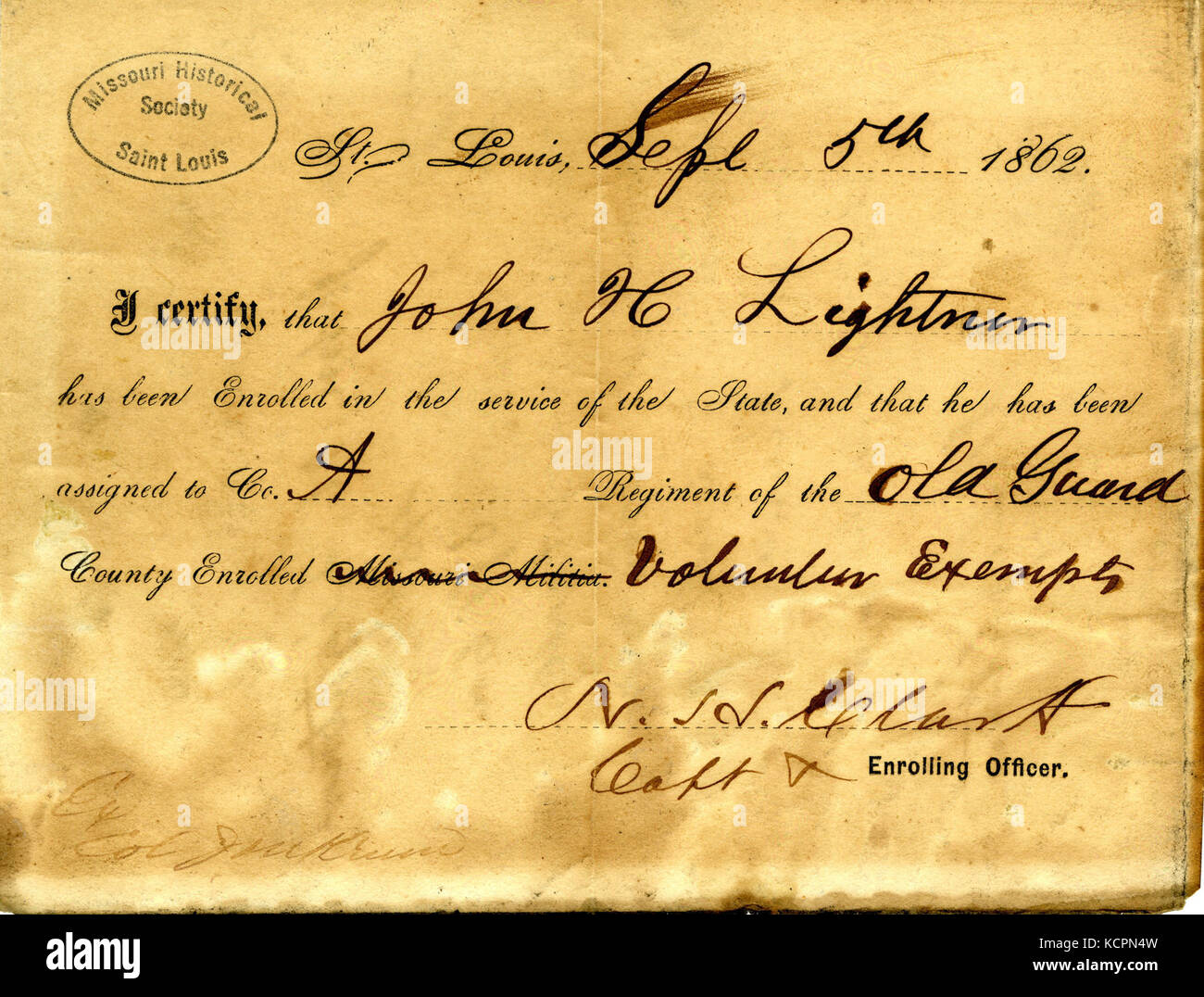 This certificate of enrollment, signed by N.H. Clark, records the enrollment of John H. Lightner in St. Louis on September 5, 1861. It provides a historical document of civil records during the American Civil War period. Stock Photo