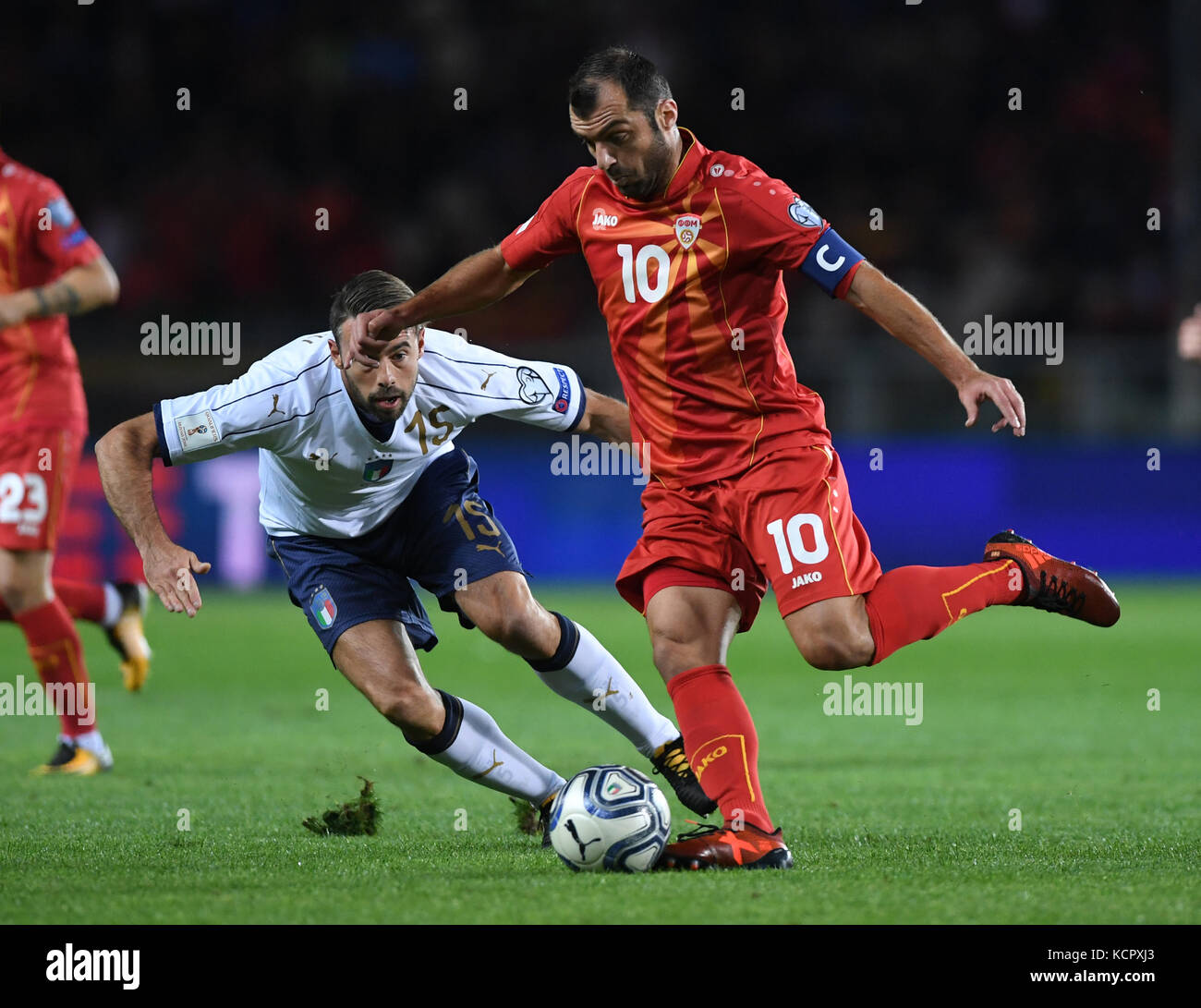 Turin, Italy. 6th Oct, 2017. Andrea Barzagli (L) of Italy competes for the ball with Goran Pandev of Macedonia during the FIFA 2018 World Cup Qualifier match between Italy and Macedonia in Turin, Italy, on Oct. 6, 2017. The game ended with a 1-1 draw. Credit: Alberto Lingria/Xinhua/Alamy Live News Stock Photo