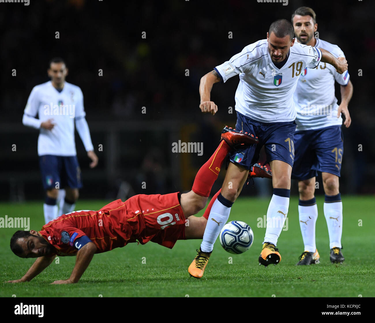 Turin, Italy. 6th Oct, 2017. Goran Pandev (L) of Macedonia vies with Leonardo Bonucci (2nd R) of Italy during the FIFA 2018 World Cup Qualifier match between Italy and Macedonia in Turin, Italy, on Oct. 6, 2017. The game ended with a 1-1 draw. Credit: Alberto Lingria/Xinhua/Alamy Live News Stock Photo