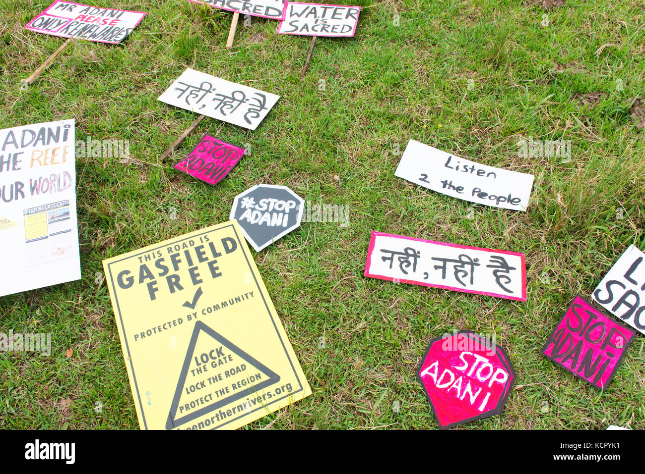 Nimbin, Australia. 7th October, 2017. Signs used at a protest against coal and Adani's Queensland Carmichael coal mine. Credit: Peter Ptschelinzew/Alamy Live News. Stock Photo