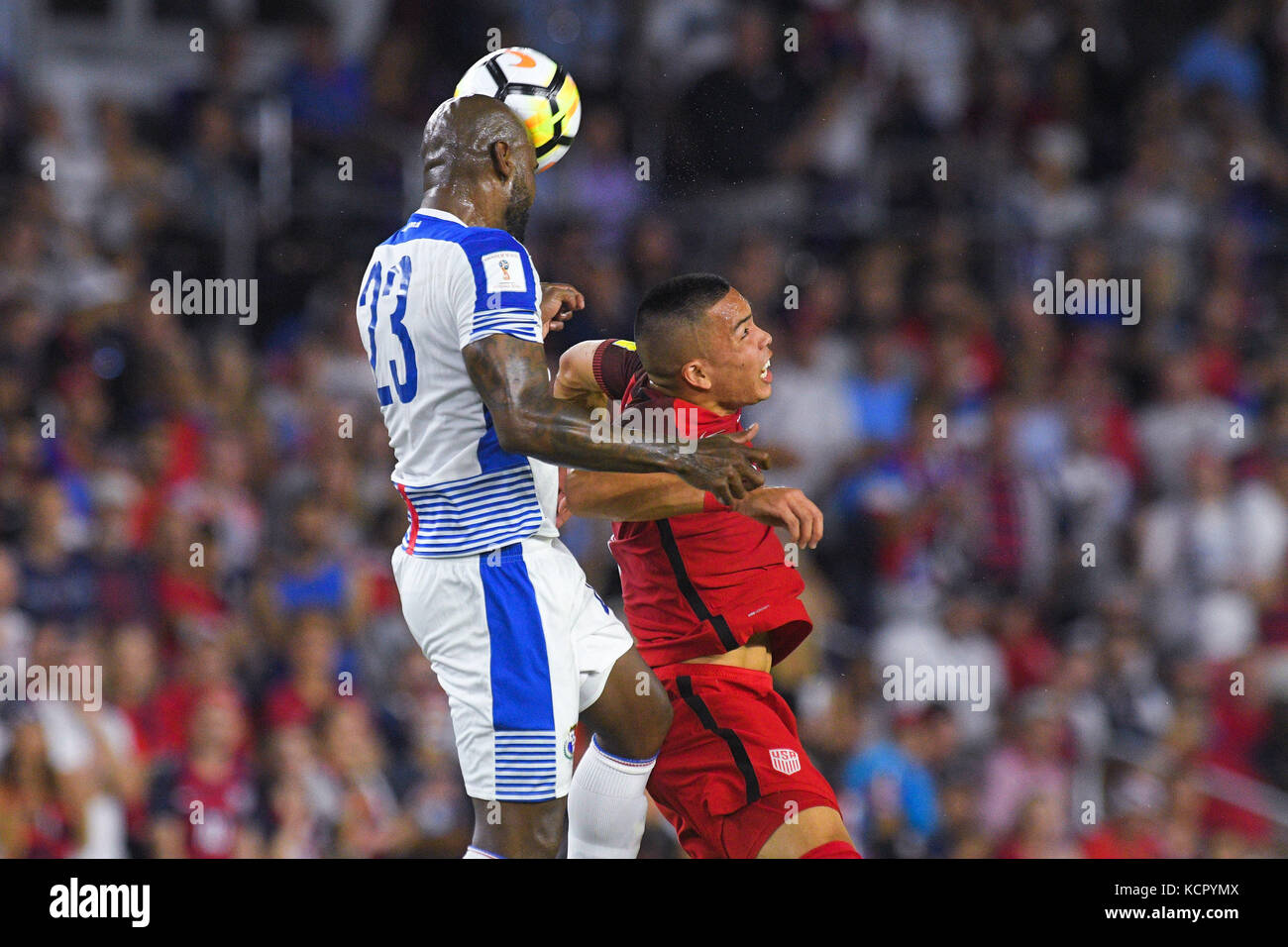 Orlando, Florida, USA. 6th Oct, 2017. Panama defender Felipe Baloy (23) and United States forward Bobby Wood (9) go airborne for a ball during a World Cup qualifying game at Orlando City Stadium on Oct. 6, 2017 in Orlando, Florida. The US won 4-0.Zuma Press/Scott A. Miller Credit: Scott A. Miller/ZUMA Wire/Alamy Live News Stock Photo